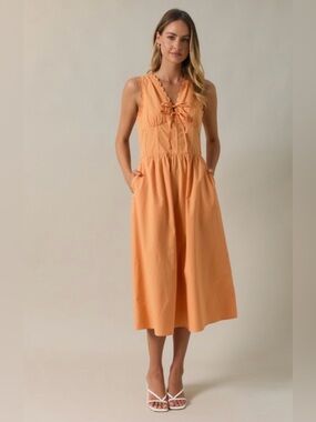 243. Sleeveless Peach Midi Dress with Ruffle Trim